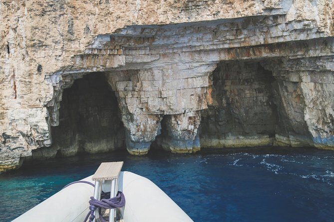 Blue Cave & 6 Islands Speedboat Tour From Split or Podstrana - Komiža on Vis: the best kind of break for food and photos