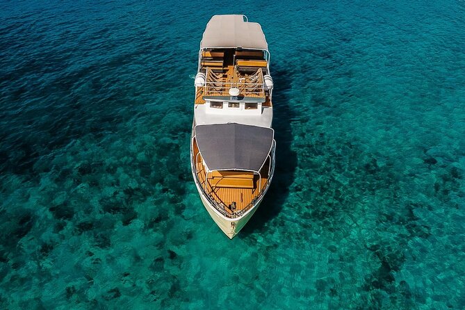 Blue Lagoon and 3 Island Boat Tour with Food and Drinks Included - Split Departure: Where You Meet and What the Morning Feels Like