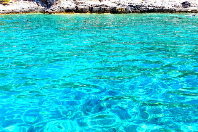 Blue Lagoon & three islands: 5 hours half day relax tour - Blue Lagoon / Krknjasi Bay: The Main Event for Snorkeling and Sunbathing