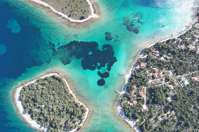 Blue Lagoon Tour from Split with Bottled Water and Wine Included - Split’s Blue Lagoon day starts with Trogir’s stone streets