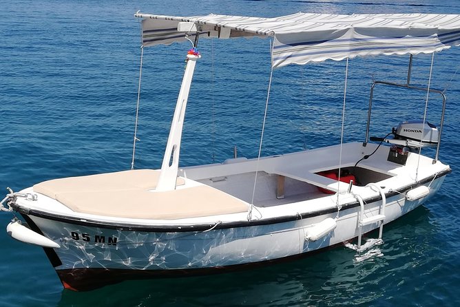 Explore west side of island Brač with Pasara boat - Traditional Dalmatian boat - Milna meeting point and getting on the BETINA-style boat