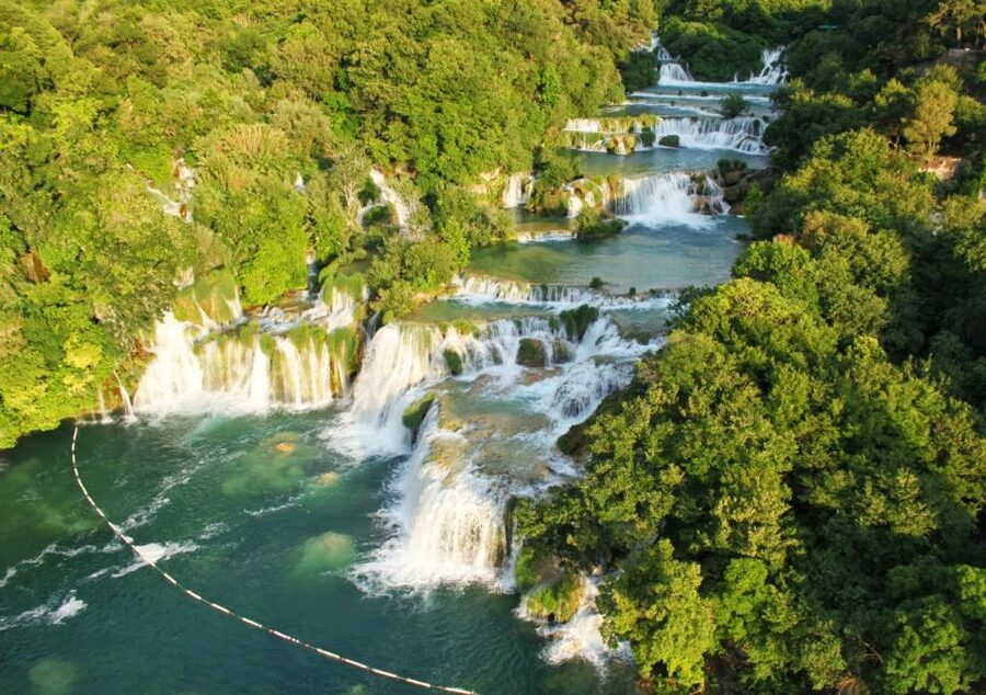 From Split: Krka Waterfalls Cruise & Trogir Walking Tour - Krka National Park arrival: trails, Ethno village, and self-paced breathing room