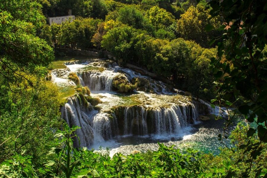 From Split: Krka Waterfalls Tour with Boat Ride & Swimming - Meeting point in Split: DM Drogerie Markt at 9:45 a.m.