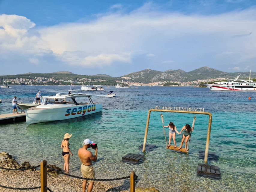 From Split: Luxury Cabin Boat Tour to The Blue Cave and Hvar - Entering the Blue Cave: duck, wait, and then enjoy the blue