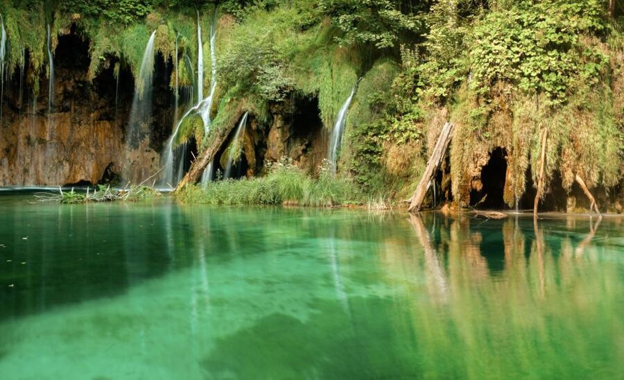 From Split or Trogir: Plitvice Lakes Guided Tour - Kozjak Lake boat ride: the perspective shift you’ll notice