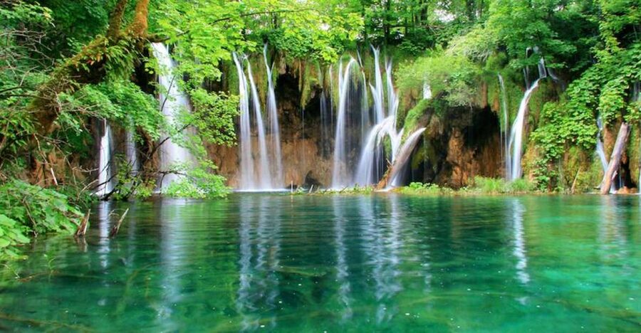 From Split or Trogir: Plitvice Lakes Private Tour - Pickup, coach ride, and the 30-minute reset in Lika-Senj County