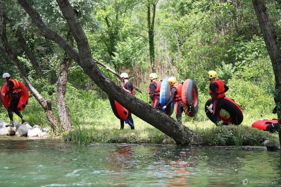 From Split: River Tubing on Cetina River - The stop that makes the trip: swimming, jumps, swings, and a waterfall slide