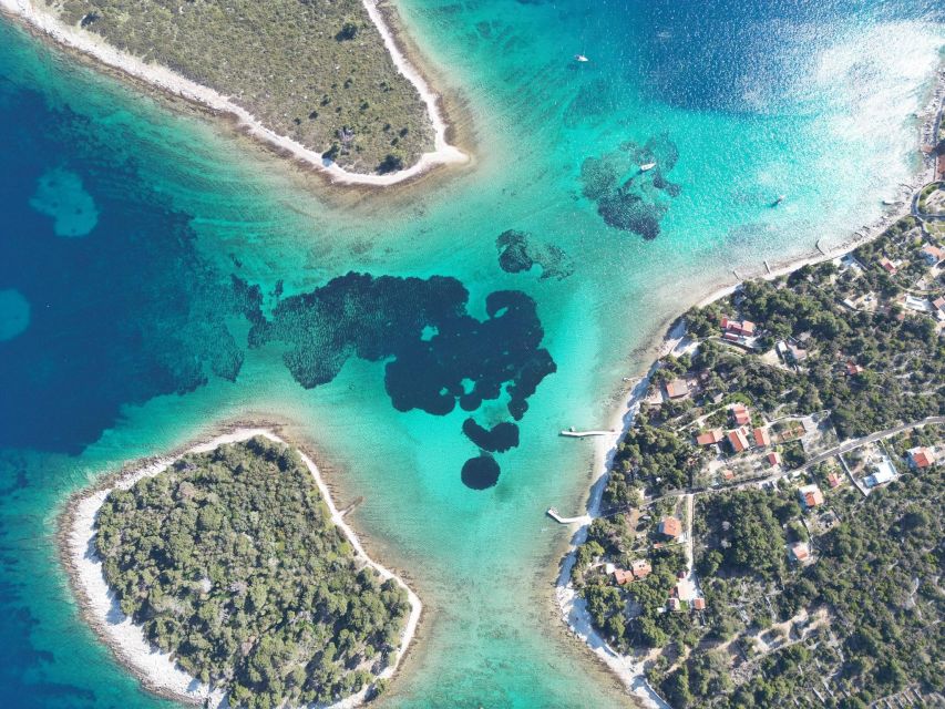 From Split: Trogir & Blue Lagoon Boat Tour with Snorkeling - Ciovo Bay pine forest and pebble beaches: the calmer coast moment