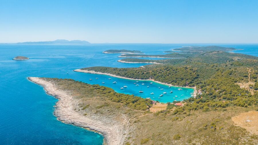 From Split: Trogir & Blue Lagoon Boat Tour with Snorkeling - The guide experience: languages and real-world flexibility