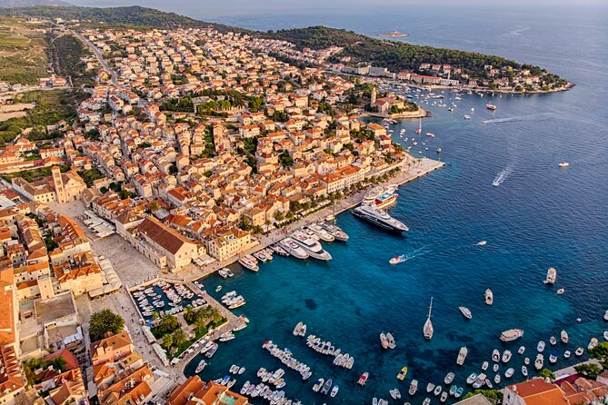 Full-Day Catamaran Cruise to Hvar & Pakleni Islands with Food and free Drinks - Pakleni Islands swim stop: the open bar meets the sea