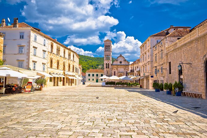 Full-Day Catamaran Cruise to Hvar & Pakleni Islands with Food and free Drinks - Šolta island swim and the “music turns up” return to Split