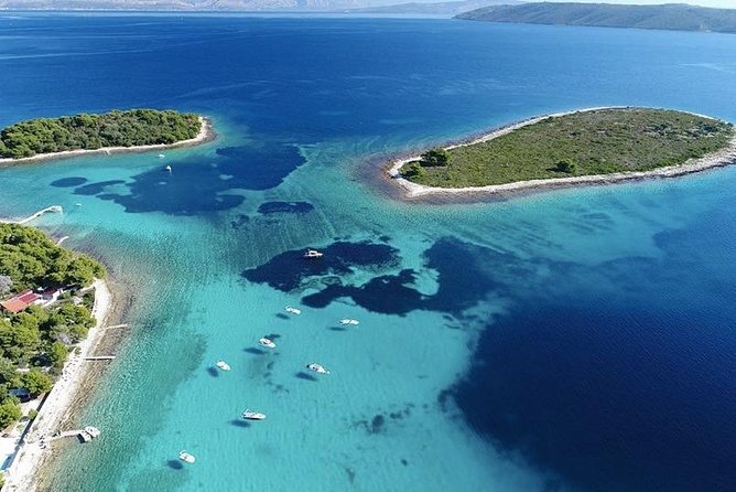 Half-Day Private Boat Tour from Split to Blue Lagoon - Trogir: towers, cathedral details, and a quick swim break