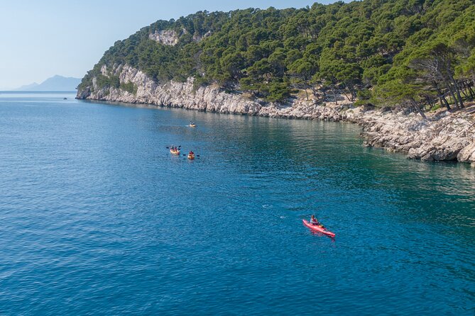 Half-Day Small-Group Kayaking Tour in Makarska - Stop-by-stop coast view: lighthouse, old town, and Biokovo on your shoulder