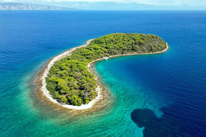 Half-day Speedboat Tour: Explore Hidden Gems of Hvar Island - Stop 1, Veliki Pokrivenik: Cliffs First, Questions Later