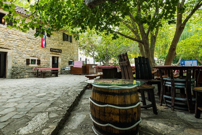 Krka Waterfalls Day Tour with Boat Ride from Split and Trogir - Skradin: Town time for lunch, swimming, and a slower pace