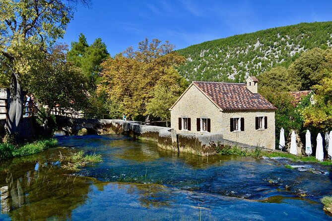 Krka Waterfalls, Lake Cruise & Skradin - Krka National Park Walk: Wooden Paths, Old Mill, and a Real Guide at the Entrance