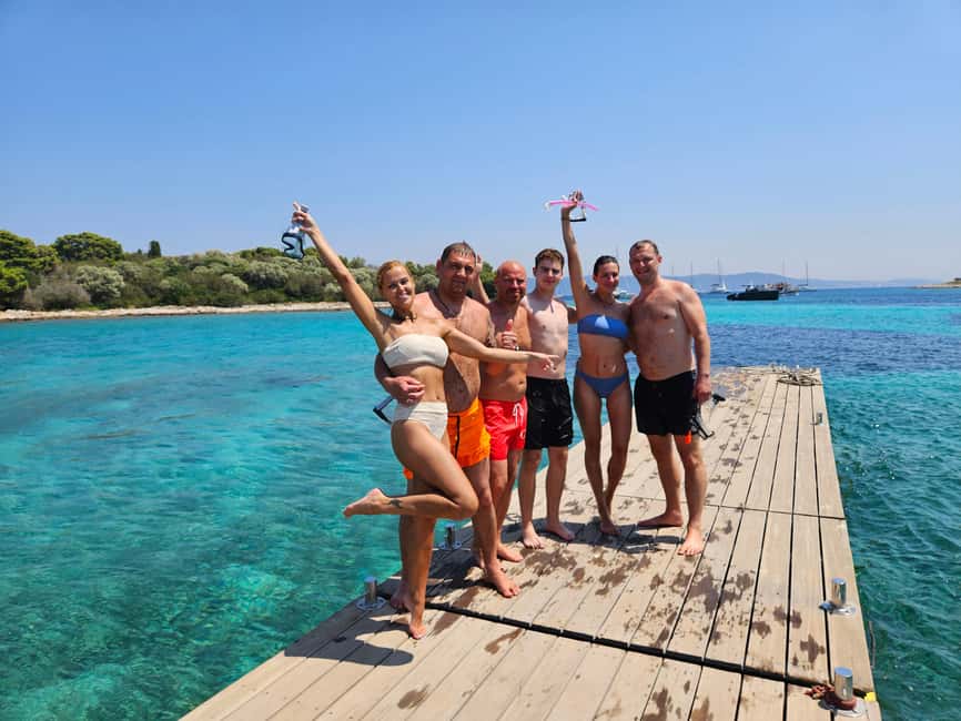 Private Blue Lagoon & 3 Islands Tour from Split - Blue Lagoon swim: snorkeling gear, drinks, and dolphin odds