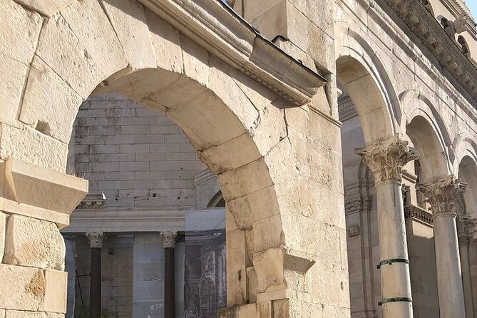 Private History Split Walking Tour in English - Riva Harbor and the bronze palace model