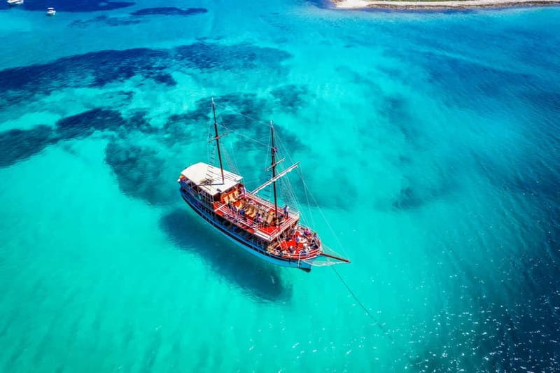 Split: 3 Island & Blue Lagoon Cruise with Lunch & Drinks - Maslinica on Šolta: village time plus your first water break