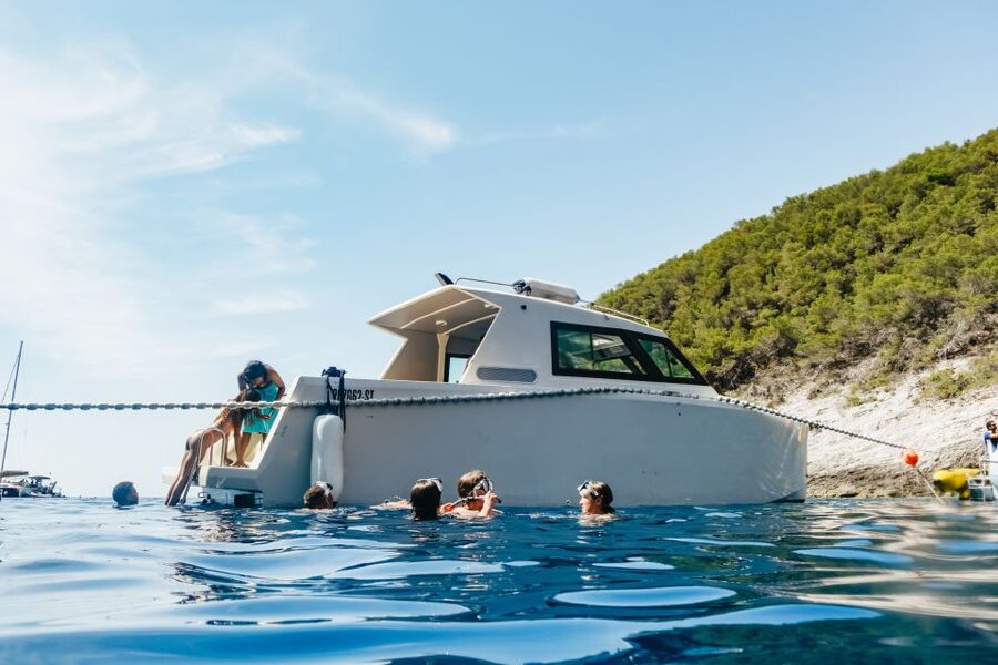 Split: Blue Cave, Vis & Hvar Full-Day Trip by Speedboat - Komiža on Vis: fishing village time, coffee, and an easy swim