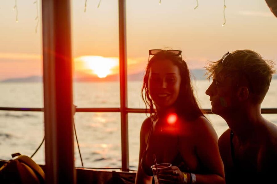 Split: Floating Festival Boat Party with Electronic Music - The first boost: welcome shot, sundown cocktails, and getting your bearings