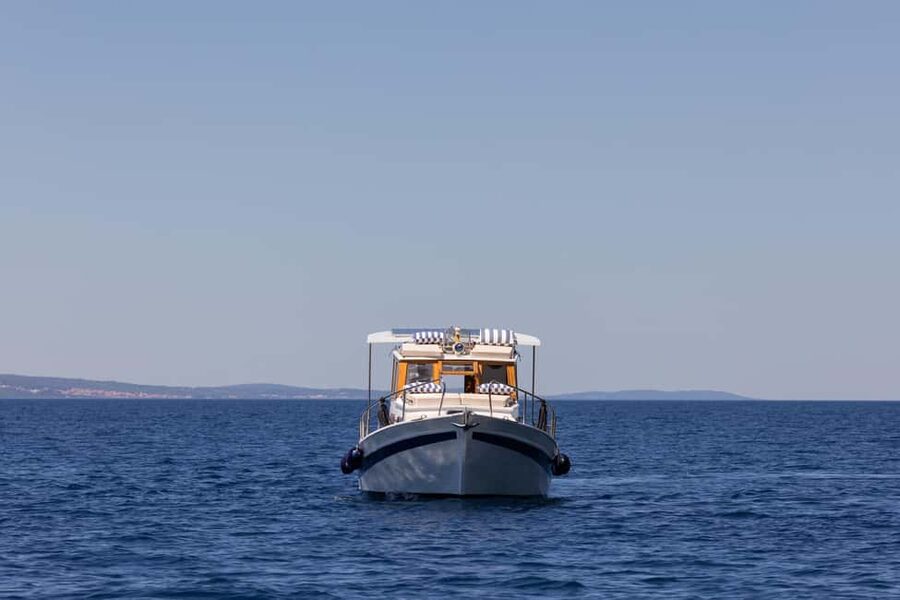 Split/Omiš/Makarska: Full or half day boat tour with "Cvita" - Cvita’s wooden decks: what a 9-meter private boat feels like