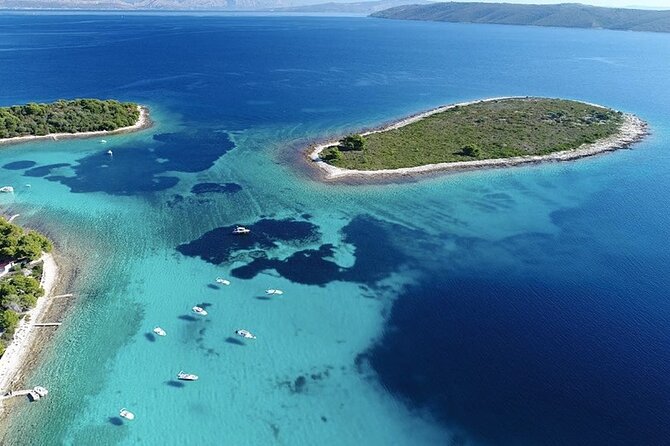 Trogir,Blue Lagoon and Šolta island full day Private Boat Tour - Krknjaši Blue Lagoon swim break: snorkel time with clear water
