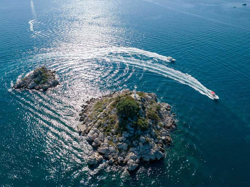 Trogir: Blue Lagoon, Maslinica, and Solinska Bay Boat Tour - Solinska Bay: Pine-Lined Beach and Speedboat Jump Fun