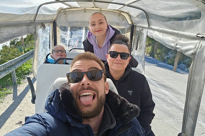 TUK TUK Split Sightseeing Adventures - Stop 2: Obojena Svjetlost pebble beach—clear water, palm shade
